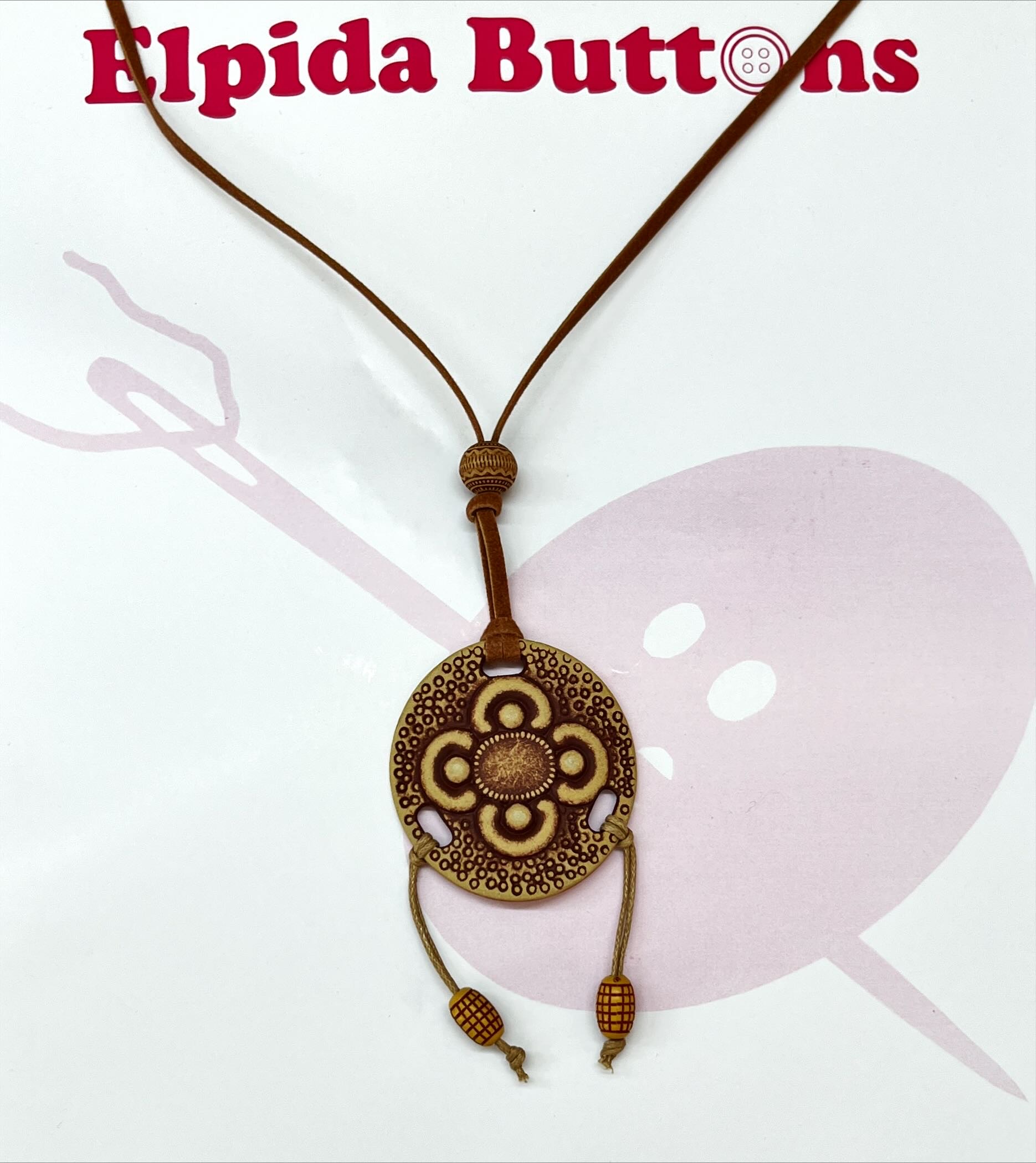 Κολιέ-καφέ-στργγυλό-με-σχέδιο